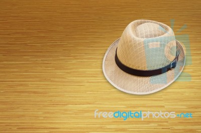 Hat On Wooden Floor Stock Photo