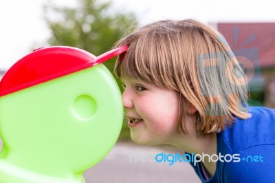 Head Of Young Girl Contacting Victor Safe Puppet Stock Photo