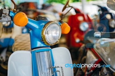 Headlight Of Blue Old Motorcycle Stock Photo