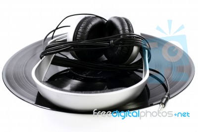 Headphone On Vinyl Record Stock Photo