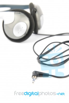 Headphones With Cord On White Stock Photo