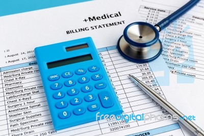 Health Care Cost Concept With Calculator Stock Photo