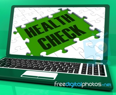 Health Check On Laptop Showing Medical Exams Stock Image