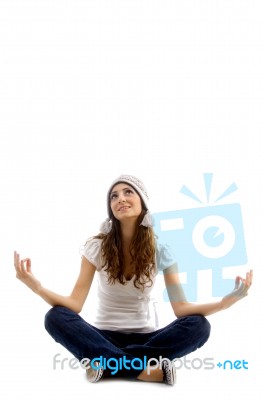 Health Conscious Girl Doing Meditation Stock Photo