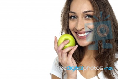 Health Conscious Woman About To Eat Fresh Green Apple Stock Photo