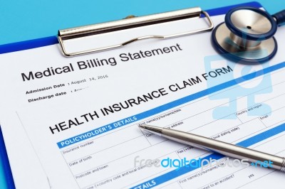 Health Insurance With Medical Bills Stock Photo