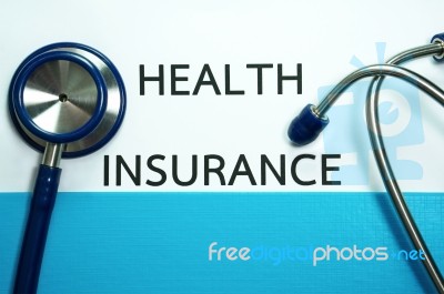 Health Insurance With Stethoscope Stock Photo