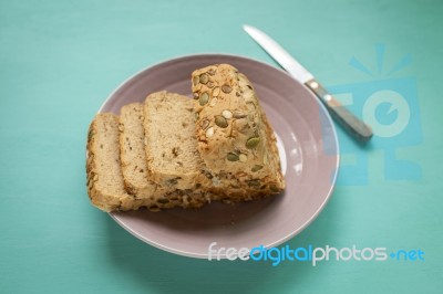 Healthy Bread On Blue Table Stock Photo