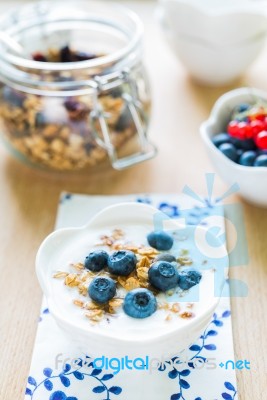 Healthy Breakfast With Granola, Yogurt And Fresh Fruits Stock Photo