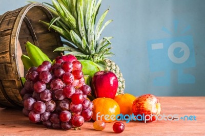 Healthy Fruits On A Wooden Stock Photo