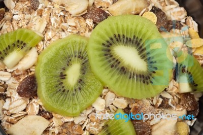 Healthy Muesli And Kiwi Background Stock Photo