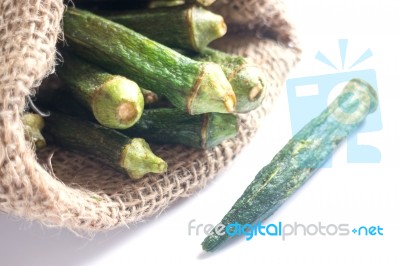 Healthy Okra Chips On Clean Background Stock Photo