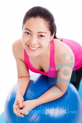 Healthy Woman - Girl Smiling And Leaning Fitness Ball Stock Photo