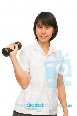 Healthy Woman Lifting A Dumbbell Stock Photo