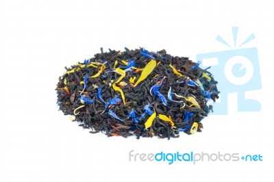 Heap Of Colorful Loose Exotic Dream Tea On White Background Stock Photo