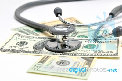 Heap Of Dollars With Stethoscope Stock Photo