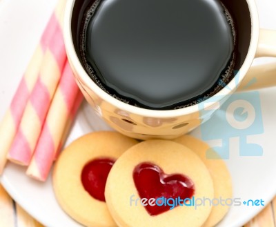 Heart And Coffee Means Valentines Bickies And Biscuits Stock Photo