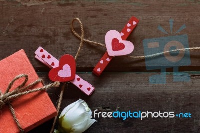 Heart And Gift On A Wooden Stock Photo