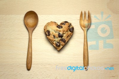 Heart Chocolate Chip Cookie On Wood Table Stock Photo