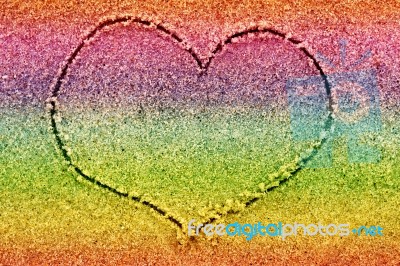 Heart Drawn In The Multicolored Sand Stock Photo