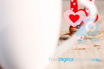 Heart Looking Through The Handle Of A Cup Stock Photo