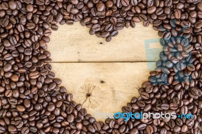 Heart Love Coffee Beans On Wood Stock Photo