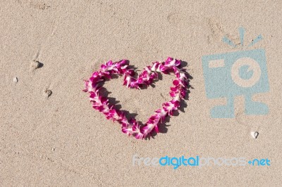 Heart Orchid Flower Garland White Sand Beach Stock Photo