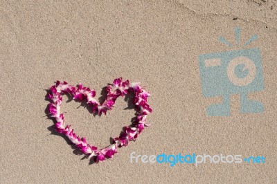 Heart Orchid Flower Garland White Sand Beach Stock Photo