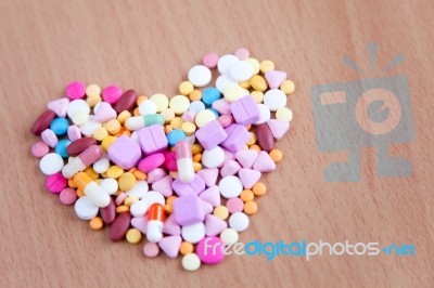 Heartshape Pills Stock Photo