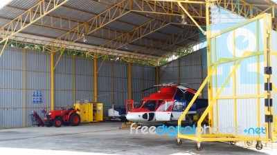 Helicopter Of Oil And Gas Industry Parked In The Hangar Stock Photo