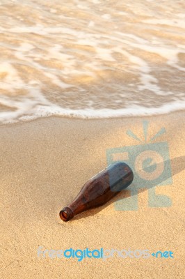 Help Bottle On Sea Shore Stock Photo