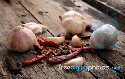 Herbs And Spices On Wooden Background Stock Photo