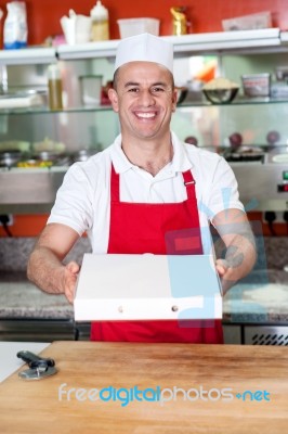 Here Is The Pizza You Ordered! Stock Photo