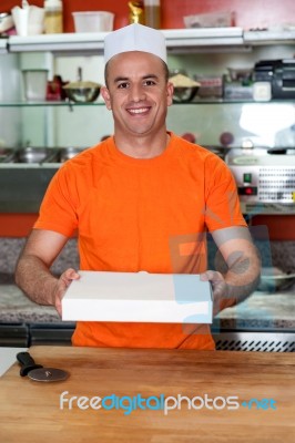 Here Is The Pizza You Ordered! Stock Photo