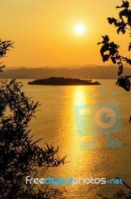 High Angle View Beautiful Lake And Island At Sunset Stock Photo