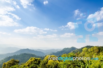 High Angle View Blue Sky Over Mountain Stock Photo