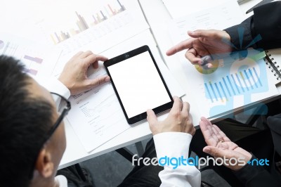 High Angle View Of Business Colleagues Using Blank Screen Digita… Stock Photo