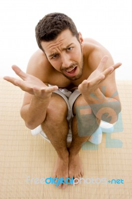 High Angle View Of Confused Man Stock Photo