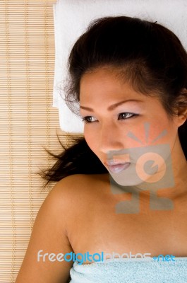 High Angle View Of Laying Smiling Woman Stock Photo