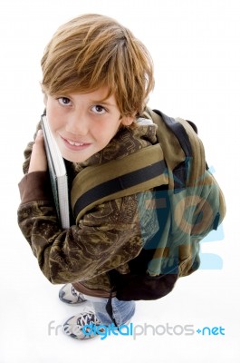 High Angle View Of School Boy Looking At Camera Stock Photo