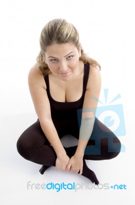 High Angle View Of Sitting Young Girl Stock Photo