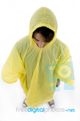 High Angle View Of Standing Man Wearing Raincoat Stock Photo