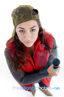 High Angle View Of Woman With Microphone Stock Photo