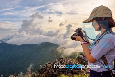 Hiker Girl Looking Photo On Camera Stock Photo