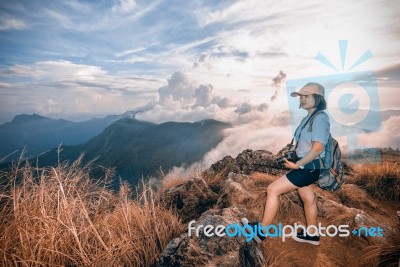 Hiker On Color Sienna Blue Two Tone Stock Photo