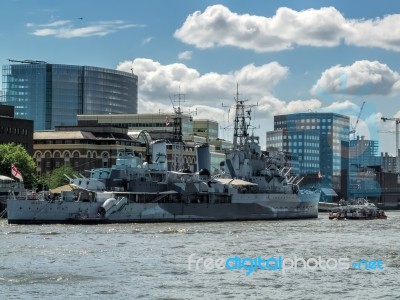 Hms Belfast Anchored Near Tower Bridge Stock Photo