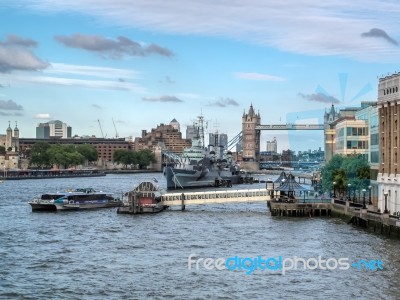 Hms Belfast Anchored Near Tower Bridge Stock Photo