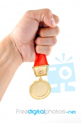 Hold Golden Medal Stock Photo