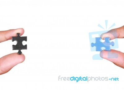 Holding A Blank Jigsaw Piece Stock Photo