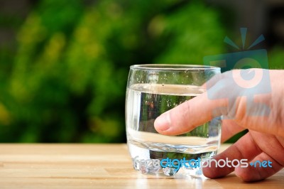 Holding Glass Of Water Stock Photo